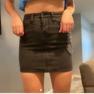 Black jean skirt with rips